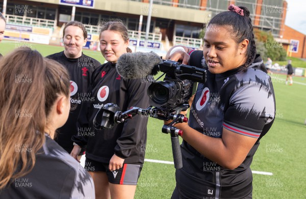 260923 - Wales Women Rugby Training Session - Sisilia Tuipulotu tries her hand at videographer ahead of a training session in at Stadium CSM, north Wales