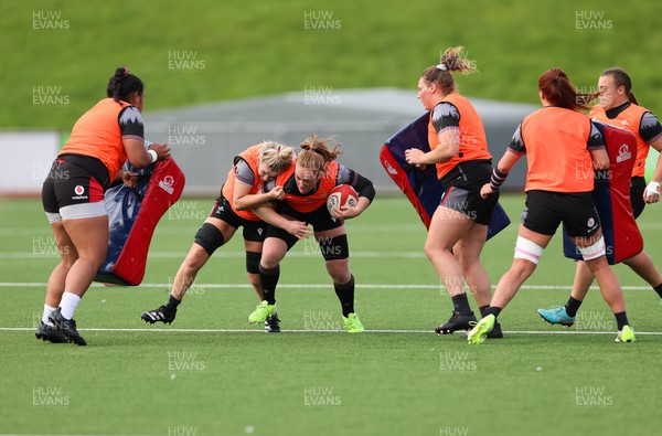 260923 - Wales Women Rugby Training Session -Abbie Fleming charges forward during a training session at Stadium CSM, north Wales