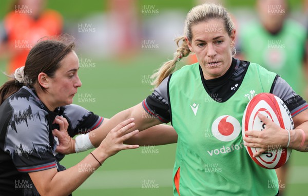 260923 - Wales Women Rugby Training Session - Kerin Lake holds off Nel Metcalfe during a training session at Stadium CSM, north Wales