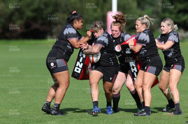 280823 - Wales Women Training Session - Left to right, Sisilia Tuipulotu, Donna Rose, Abbie Fleming, Kelsey Jones and Alex Callender during training session