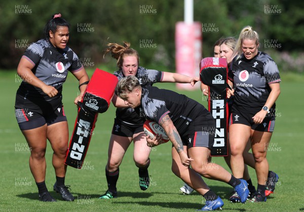 280823 - Wales Women Training Session - Left to right, Sisilia Tuipulotu, Abbie Fleming, Donna Rose and Kelsey Jones during training session