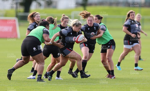 280823 - Wales Women Training Session - Kelsey Jones charges forward during training session