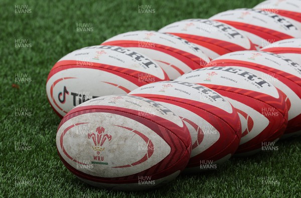 280923 - Wales Women Rugby Training Session - WRU branded rugby balls during a training session ahead of the match against USA at Stadium CSM