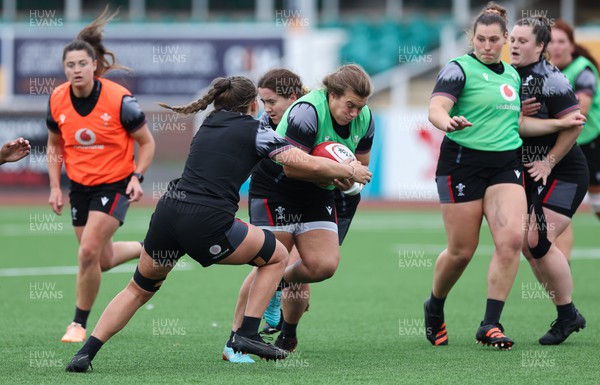 280923 - Wales Women Rugby Training Session - Carys Phillips drives forward during a training session ahead of the match against USA at Stadium CSM