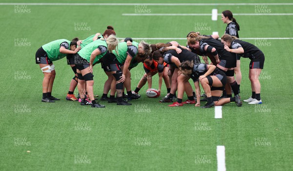 280923 - Wales Women Rugby Training Session - The Wales squad scrummage during a training session ahead of the match against USA at Stadium CSM