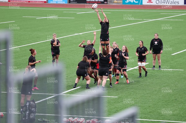 280923 - Wales Women Rugby Training Session - Bryonie King takes a line out during a training session ahead of the match against USA at Stadium CSM
