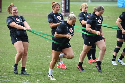 290725 - Wales Women Rugby Training at The Southport School - Gwenllian Pyrs and Kelsey Jones alongside Georgia Evans and Maisie Davies during a Wales Women’s rugby training session ahead of the second test against Australia