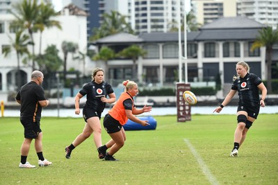 290725 - Wales Women Rugby Training at The Southport School - Molly Reardon passes to Alaw Pyrs during a Wales Women’s rugby training session ahead of the second test against Australia
