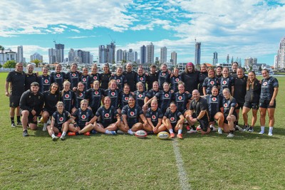 290725 - Wales Women Rugby Training at The Southport School - The Wales Women’s rugby squad and management pose up for a photograph after a training session ahead of the second test against Australia