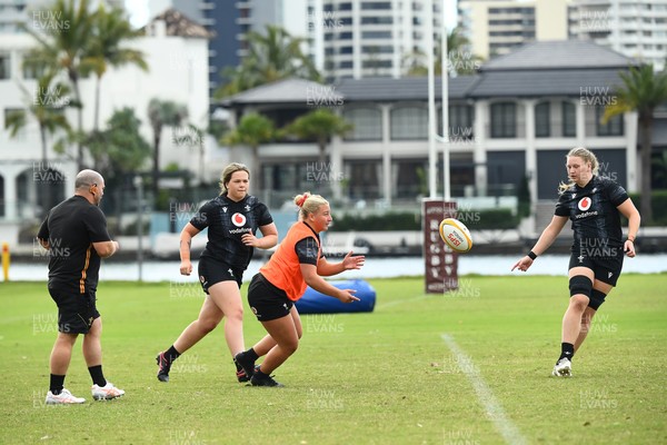 290725 - Wales Women Rugby Training at The Southport School - Molly Reardon passes to Alaw Pyrs during a Wales Women’s rugby training session ahead of the second test against Australia
