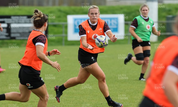 301023 - Wales Women Rugby Training Session - Meg Webb breaks away during a training session at Pakuranga United RFC ahead of their WXV1 match against Australia