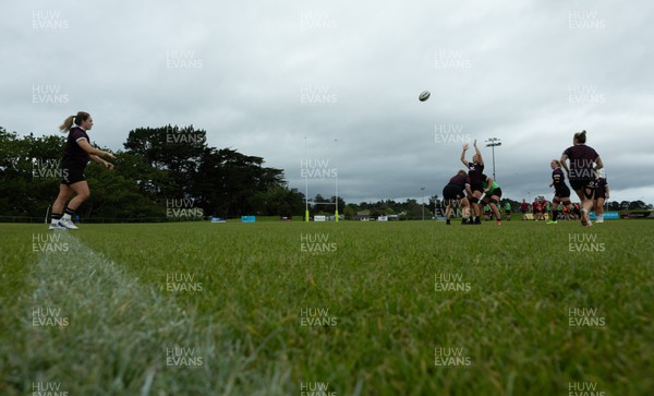 301023 - Wales Women Rugby Training Session - Kat Evans runs through line out drills during a training session at Pakuranga United RFC ahead of their WXV1 match against Australia