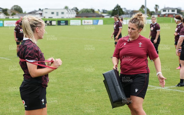 301023 - Wales Women Rugby Training Session - Coach Catrina Nicholas-McLaughlin works with Meg Webb during a training session at Pakuranga United RFC ahead of their WXV1 match against Australia