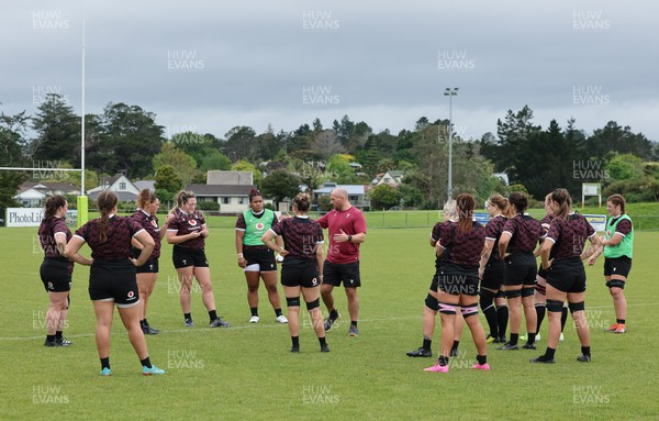 301023 - Wales Women Rugby Training Session - Forwards coach Mike Hill at work with the team during a training session at Pakuranga United RFC ahead of their WXV1 match against Australia