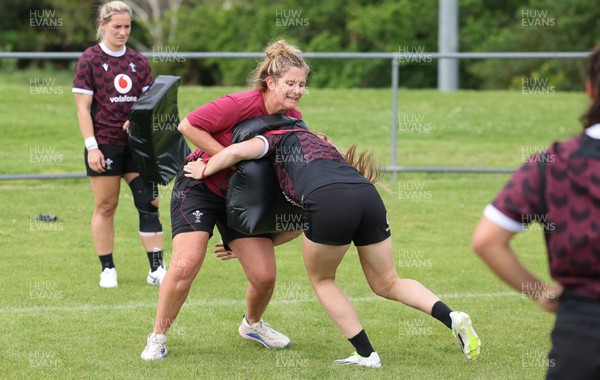 301023 - Wales Women Rugby Training Session - Coach Catrina Nicholas-McLaughlin works with Hannah Jones during a training session at Pakuranga United RFC ahead of their WXV1 match against Australia