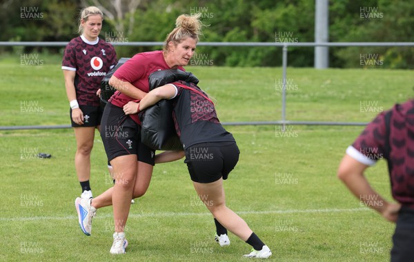 301023 - Wales Women Rugby Training Session - Coach Catrina Nicholas-McLaughlin works with Hannah Jones during a training session at Pakuranga United RFC ahead of their WXV1 match against Australia