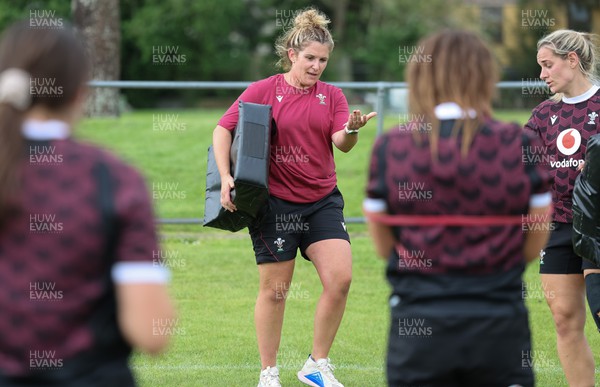 301023 - Wales Women Rugby Training Session - Coach Catrina Nicholas-McLaughlin works with the backs during a training session at Pakuranga United RFC ahead of their WXV1 match against Australia