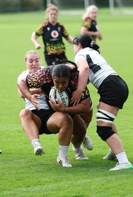 090926 - Wales Women Rugby Training Match - Sisilia Tuipulotu scores a try during a training match ahead of the WRX Series of matches 