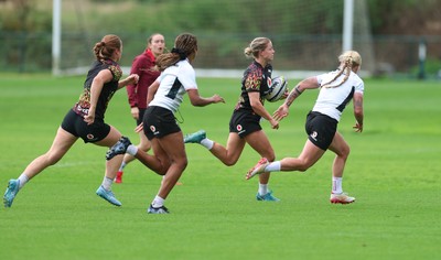 090926 - Wales Women Rugby Training Match - Amy Williams races in to score a try during a training match ahead of the WRX Series of matches 