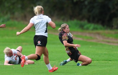 090926 - Wales Women Rugby Training Match - Amy Williams races in to score a try during a training match ahead of the WRX Series of matches 