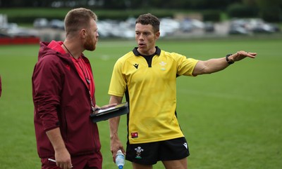 090926 - Wales Women Rugby Training Match - Referee Craig Evans who took charge of a Wales training match ahead of the WRX Series of matches with Tyrone Holmes, Defence coach 