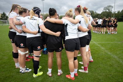 090926 - Wales Women Rugby Training Match - Wales squad members huddle up during a training match ahead of the WRX Series of matches 