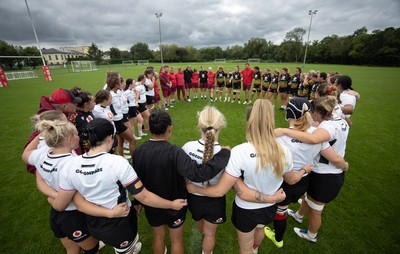 090926 - Wales Women Rugby Training Match - Wales squad members huddle up during a training match ahead of the WRX Series of matches 