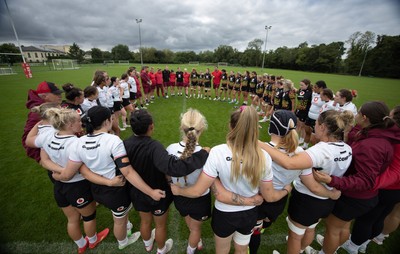 090926 - Wales Women Rugby Training Match - Wales squad members huddle up during a training match ahead of the WRX Series of matches 