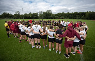 090926 - Wales Women Rugby Training Match - Wales squad members huddle up during a training match ahead of the WRX Series of matches 