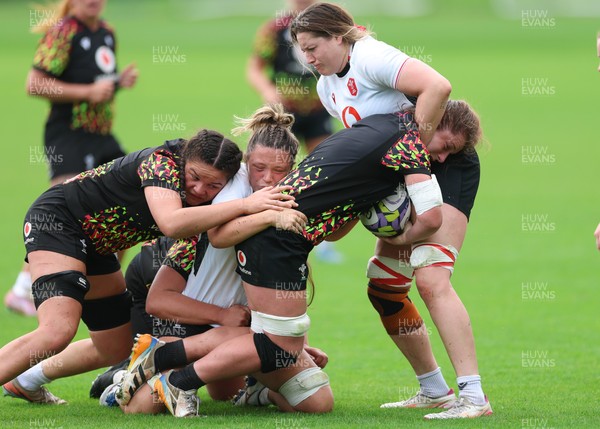 090926 - Wales Women Rugby Training Match - Kate Williams is tackled during a training match ahead of the WRX Series of matches 