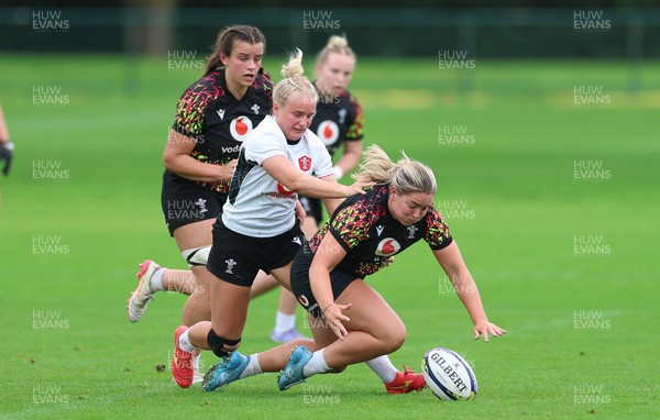 090926 - Wales Women Rugby Training Match - Freya Bell, Seren Singleton and Branwen Metcalfe during a training match ahead of the WRX Series of matches 