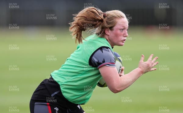 111022 - Wales Women Rugby Training Session - Wales’ Abbie Fleming is tackled during training session ahead of their Women’s Rugby World Cup match against New Zealand