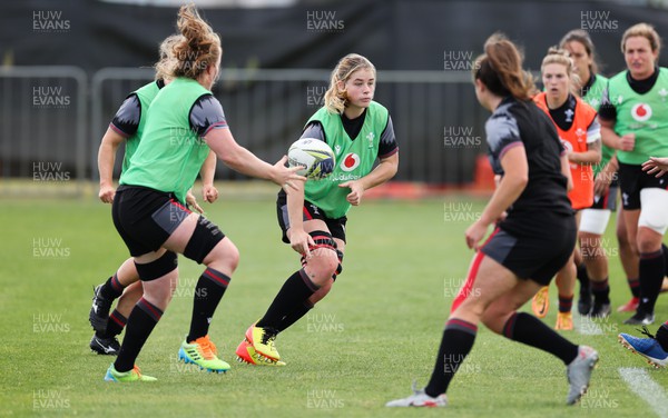 111022 - Wales Women Rugby Training Session - Wales’ Bethan Lewis passes to Abbie Fleming during training session ahead of their Women’s Rugby World Cup match against New Zealand