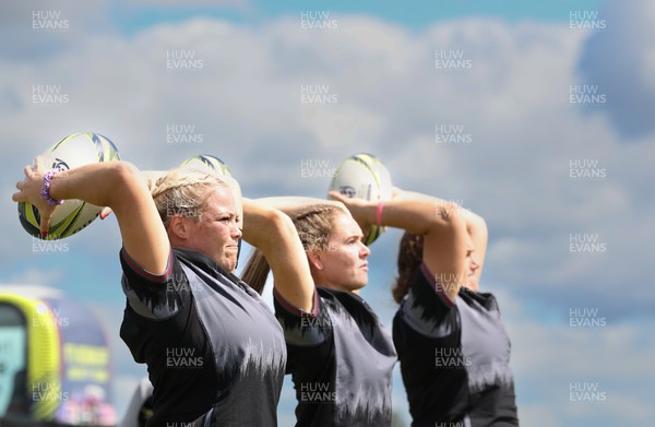 111022 - Wales Women Rugby Training Session - Left to right Wales’ Kelsey Jones, Kat Evans and Carys Phillips take line outs  during training session ahead of their Women’s Rugby World Cup match against New Zealand