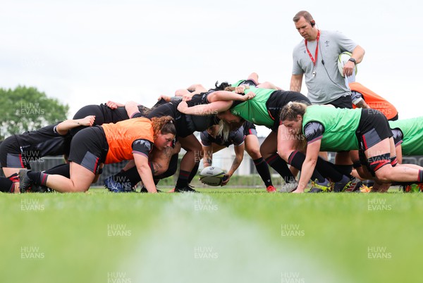 121022 - Wales Women Rugby Training Session - Wales’ head coach Ioan Cunningham watches the scrum during a training session ahead of their Women’s Rugby World Cup match against New Zealand