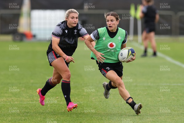 121022 - Wales Women Rugby Training Session - Wales’ Jasmine Joyce gets away from Lowri Norkett during a training session ahead of their Women’s Rugby World Cup match against New Zealand