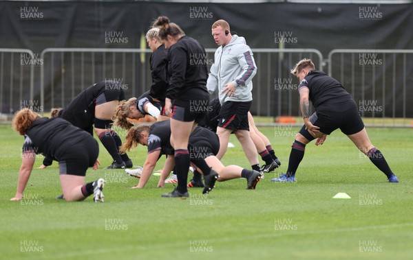 141022 - Wales Women Rugby Training Session - Wales strength and conditioning coach Jamie Cox works with the team during training ahead of the Women’s Rugby World Cup match against New Zealand