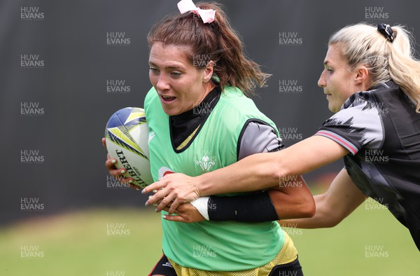 191022 - Wales Women Rugby Training Session - Wales’s Georgia Evans is tackled by Lowri Norkett during training ahead of their Women’s Rugby World Cup match against Australia