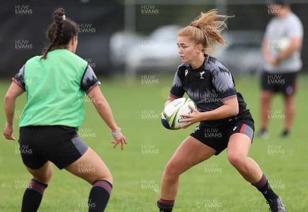 251022 - Wales Women Rugby Training Session - Niamh Terry of Wales takes on Ffion Lewis of Wales during training ahead of their Women’s Rugby World Cup Quarter Final against New Zealand
