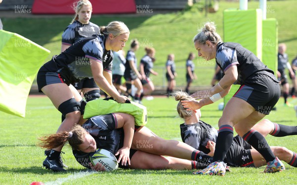 270922 - Wales Women Rugby Training Session - Wales’ Alisha Butchers, Gwenllian Pyrs and Kerin Lake during training ahead of the start of the Women’s Rugby World Cup