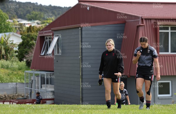 271022 - Wales Women Rugby Training Session - Alex Callender and Robyn Wilkins of Wales walk out for a training session ahead of the Women’s Rugby World Cup Quarter Final against New Zealand