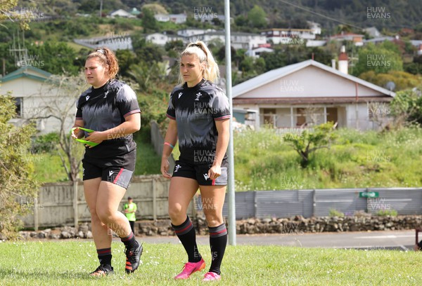 271022 - Wales Women Rugby Training Session - Gwenllian Pyrs and Lowri Norkett of Wales walk out for a training session ahead of the Women’s Rugby World Cup Quarter Final against New Zealand