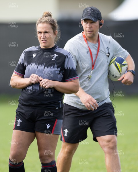 271022 - Wales Women Rugby Training Session - Siwan Lillicrap of Wales with Wales head coach Ioan Cunningham during a training session ahead of the Women’s Rugby World Cup Quarter Final against New Zealand