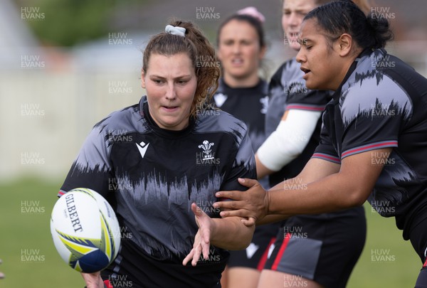 271022 - Wales Women Rugby Training Session - Gwenllian Pyrs and Sisilia Tuipulotu of Wales during a training session ahead of the Women’s Rugby World Cup Quarter Final against New Zealand