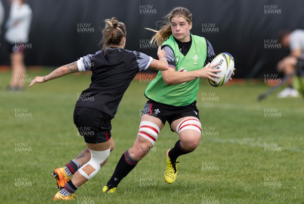 271022 - Wales Women Rugby Training Session - Bethan Lewis of Wales takes on Keira Bevan of Wales during a training session ahead of the Women’s Rugby World Cup Quarter Final against New Zealand