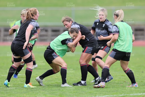 280922 - Wales Women Rugby Training Session - Wales’ Jasmine Joyce is held by Siwan Lillicrap during a training session in Auckland ahead of the start of the Women’s Rugby World Cup