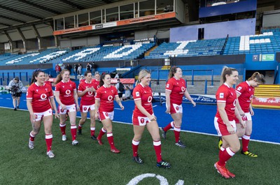 240323 - Wales Woman Rugby - The Wales Women squad walk out for a team photograph during Captains Walkthrough and kicking practice ahead of the opening Women’s 6 Nations match against Ireland