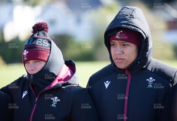 271023 - Wales Women Rugby Team Walkthrough - Carys Phillips and Sisilia Tuipulotu wrap up against the cold during the Wales Women’s rugby squad walkthrough ahead of Wales’ WXV1 match against New Zealand in Dunedin 