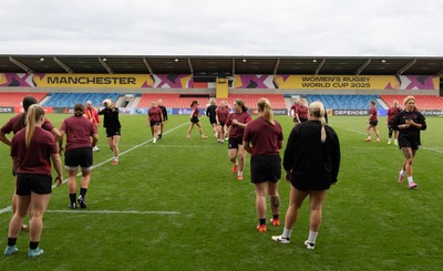 220825 - Wales Women Rugby World Cup Captain’s Run -The Wales squad warm up during Captain’s Run ahead of their first Women’s Rugby World Cup match against Scotland at the Salford Community Stadium