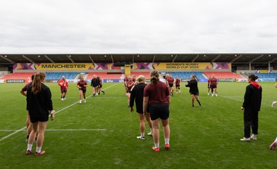 220825 - Wales Women Rugby World Cup Captain’s Run -The Wales squad warm up during Captain’s Run ahead of their first Women’s Rugby World Cup match against Scotland at the Salford Community Stadium